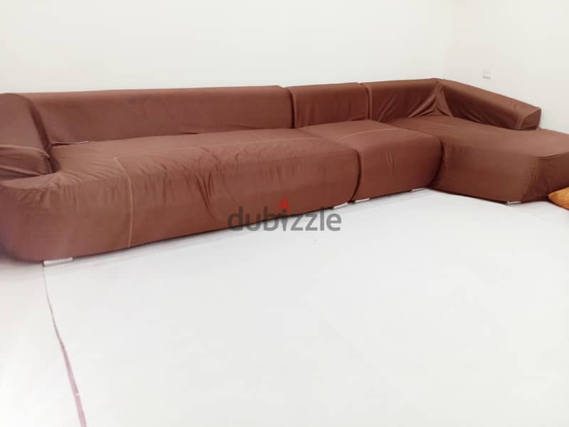 A couch that fits seven people. 2