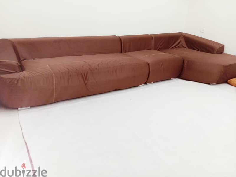 A couch that fits seven people. 4