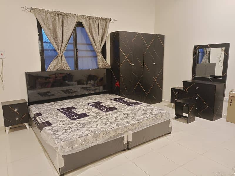 Beautiful designs of complete bedroom set in black color 1