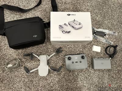 DJI Mini 2 Fly More Combo Quadcopter w Remote Controller