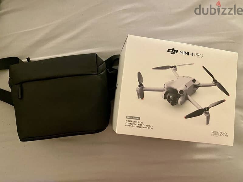 DJI - Mini 4 Pro Fly More Combo Plus Drone and RC 2 Remote Control Bu 1