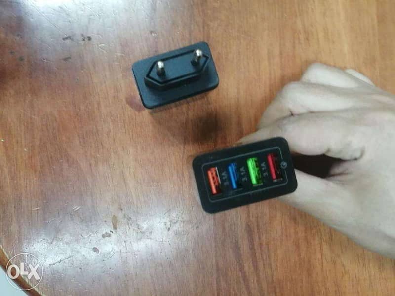 فيشة متعددة كشاحن للسفر جديد new travel charger 0