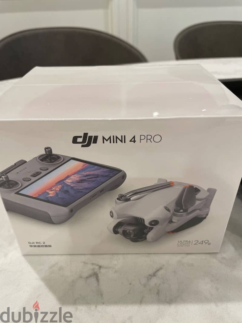 DJI - Mini 4 Pro Fly More Combo Plus Drone and RC 2 Remote Control Bu 1