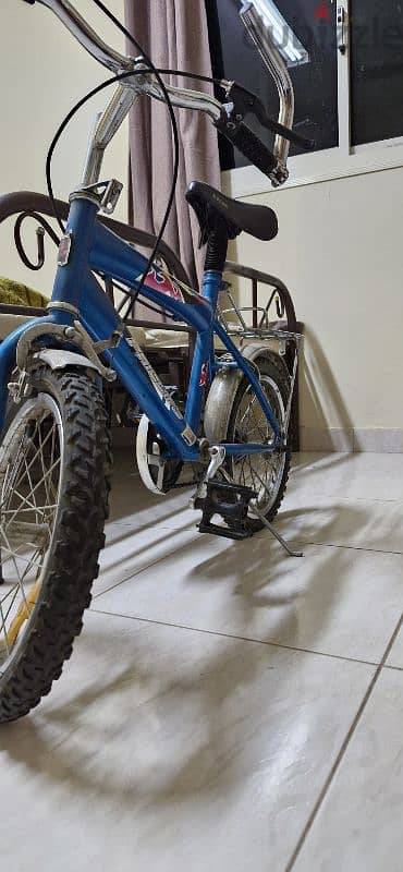 good condition blue bycicle 1