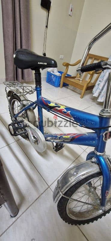 good condition blue bycicle 2