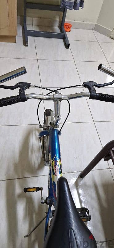 good condition blue bycicle 4