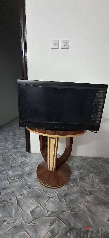 URGENT SALE . . MICROWAVE. OVEN + FURNITURE TABLE FOR SALE