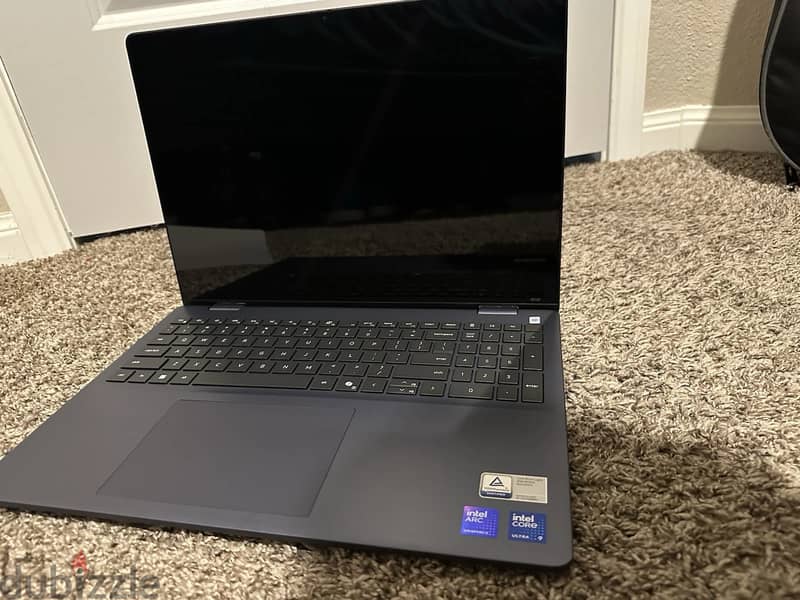 Dell Plus 2 in 1 laptop 1
