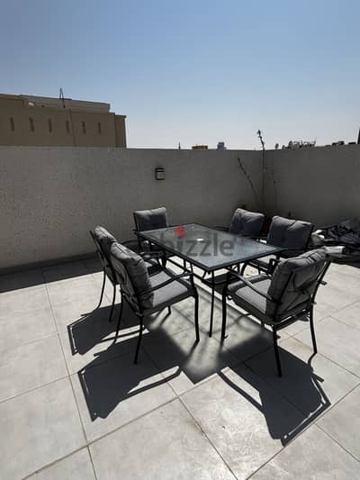 Out door dining table with 6 chairs