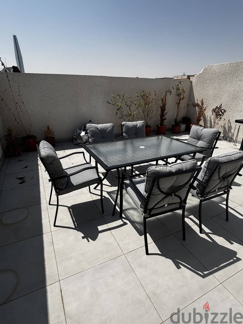 Out door dining table with 6 chairs 1