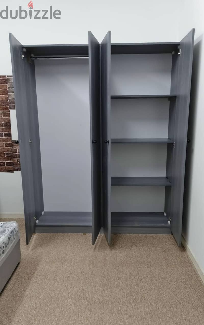 Four door wardrobe new 1