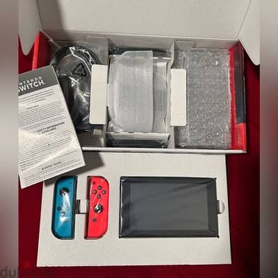 Brand new Nintendo Switch 32GB Red/Blue
