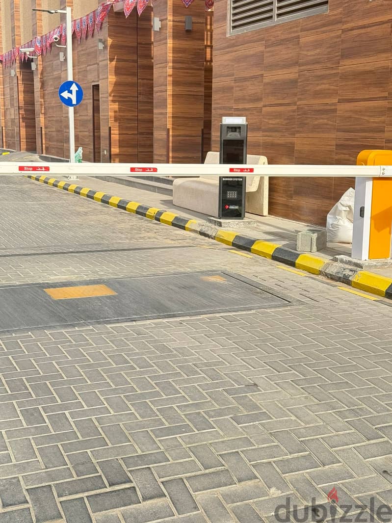 حلول متكاملة لبوابات السيارات وتنظيم المواقف 7