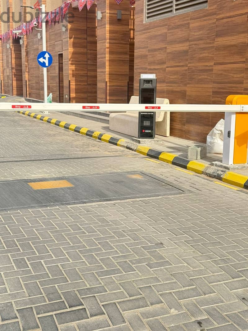 حلول أمنية متكاملة للبوابات الآلية ومواقف السيارات 4