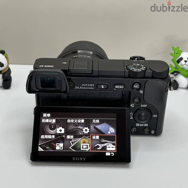Sony Alpha a6000 24.3MP Mirrorless Digital Camera w/16-50mm OSS Lens E 3